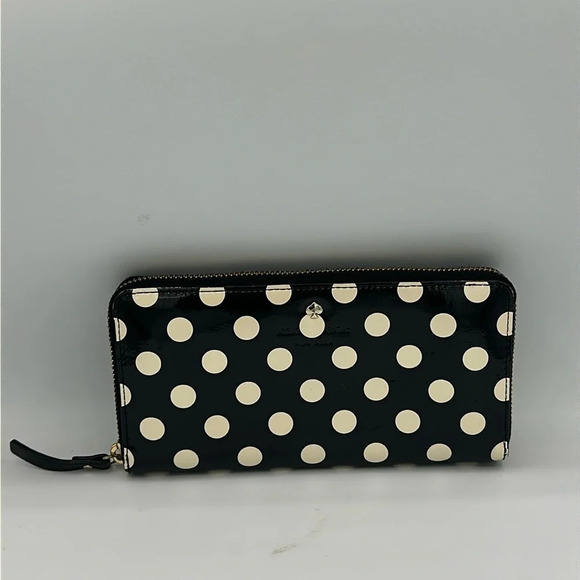 kate spade Handbags - Kate Spade Carlisle Street Lacey Midnight / Cream polka dot zip around wallet